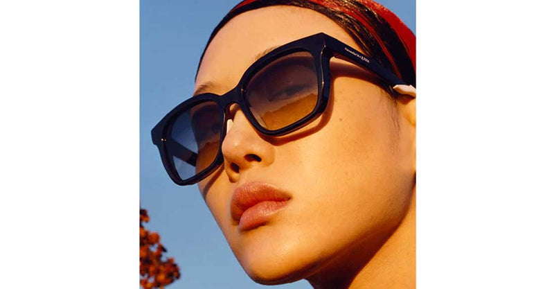 Woman wearing Alexander McQueen AW2020 sunglasses