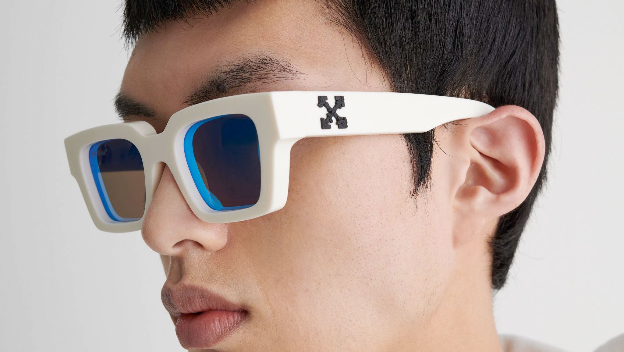 off white sunglasses on face